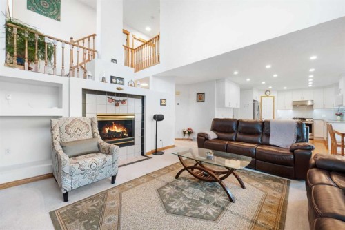 43 Edgebrook Cove Nw, Calgary, AB - Indoor Photo Showing Living Room With Fireplace