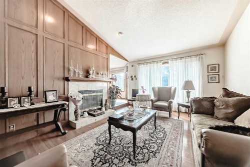 131 Varsity Estates Terrace Nw, Calgary, AB - Indoor Photo Showing Living Room With Fireplace