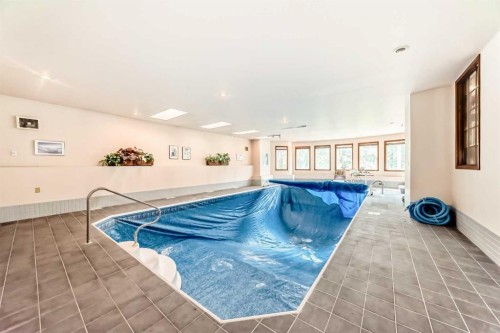 131 Varsity Estates Terrace Nw, Calgary, AB - Indoor Photo Showing Other Room With In Ground Pool