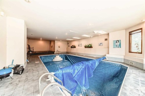 131 Varsity Estates Terrace Nw, Calgary, AB - Indoor Photo Showing Other Room With In Ground Pool