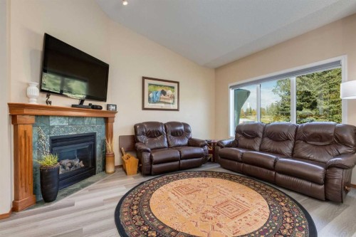258 Millview Gardens Sw, Calgary, AB - Indoor Photo Showing Living Room With Fireplace