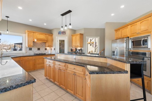 40 Arbour Estates Green Nw, Calgary, AB - Indoor Photo Showing Kitchen With Upgraded Kitchen