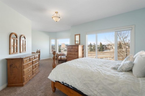 40 Arbour Estates Green Nw, Calgary, AB - Indoor Photo Showing Bedroom