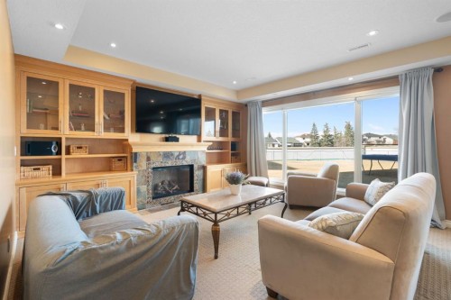 40 Arbour Estates Green Nw, Calgary, AB - Indoor Photo Showing Living Room With Fireplace