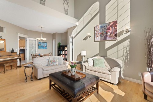 40 Arbour Estates Green Nw, Calgary, AB - Indoor Photo Showing Living Room