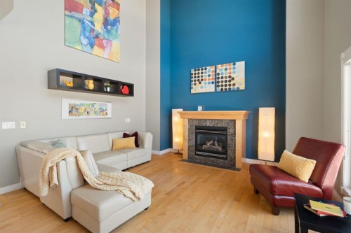 40 Arbour Estates Green Nw, Calgary, AB - Indoor Photo Showing Living Room With Fireplace