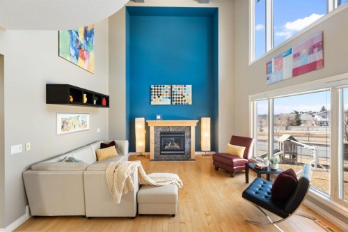 40 Arbour Estates Green Nw, Calgary, AB - Indoor Photo Showing Living Room With Fireplace