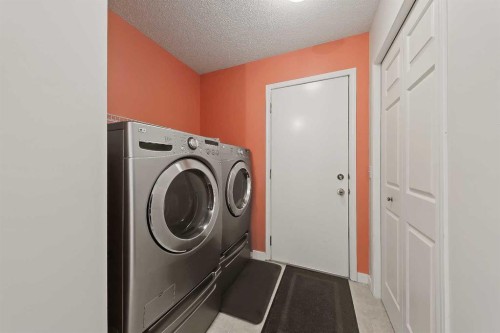 123 Arbour Butte Road Nw, Calgary, AB - Indoor Photo Showing Laundry Room