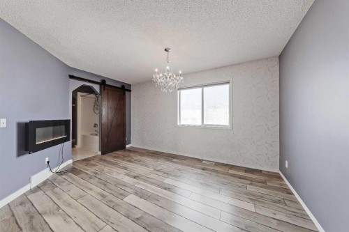 123 Arbour Butte Road Nw, Calgary, AB - Indoor Photo Showing Other Room