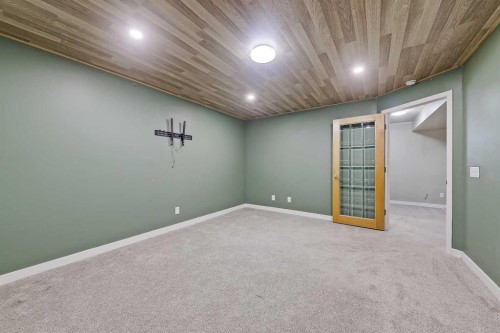 123 Arbour Butte Road Nw, Calgary, AB - Indoor Photo Showing Other Room