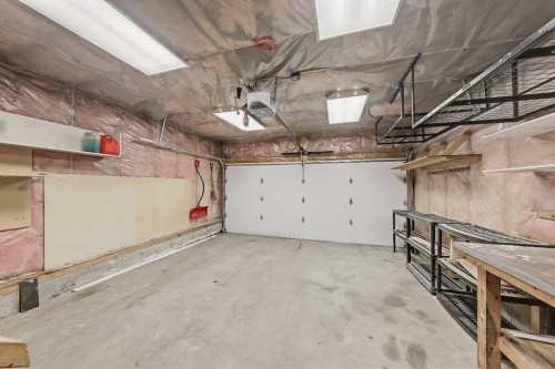 123 Arbour Butte Road Nw, Calgary, AB - Indoor Photo Showing Garage
