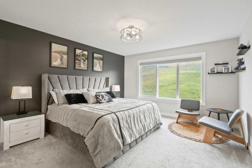 36 Cranbrook Cape Se, Calgary, AB - Indoor Photo Showing Bedroom