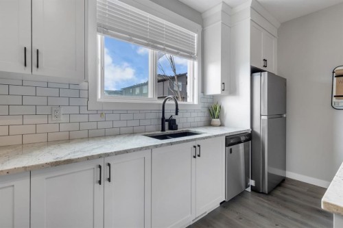 11 Sage Bluff Gate Nw, Calgary, AB - Indoor Photo Showing Kitchen With Stainless Steel Kitchen With Double Sink