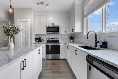 11 Sage Bluff Gate Nw, Calgary, AB - Indoor Photo Showing Kitchen With Stainless Steel Kitchen With Upgraded Kitchen