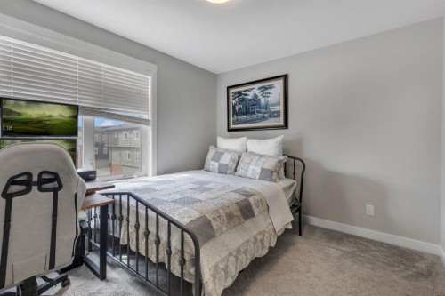 11 Sage Bluff Gate Nw, Calgary, AB - Indoor Photo Showing Bedroom