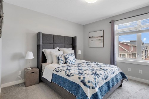11 Sage Bluff Gate Nw, Calgary, AB - Indoor Photo Showing Bedroom