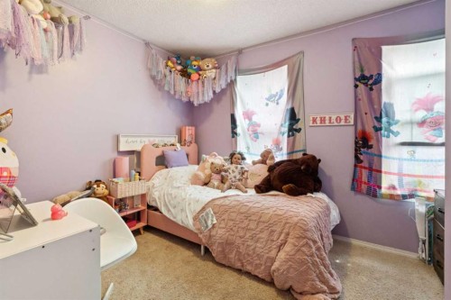 45 Copperfield Heath Se, Calgary, AB - Indoor Photo Showing Bedroom