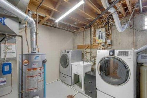 3 Madigan Court Ne, Calgary, AB - Indoor Photo Showing Laundry Room