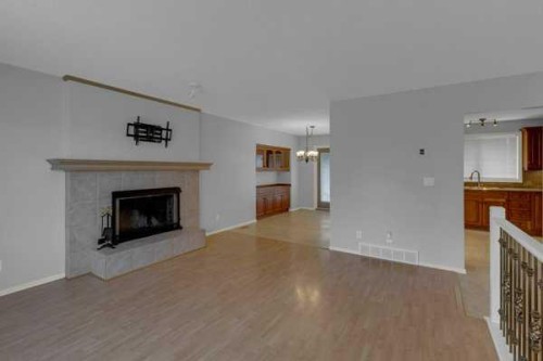 3 Madigan Court Ne, Calgary, AB - Indoor Photo Showing Living Room With Fireplace