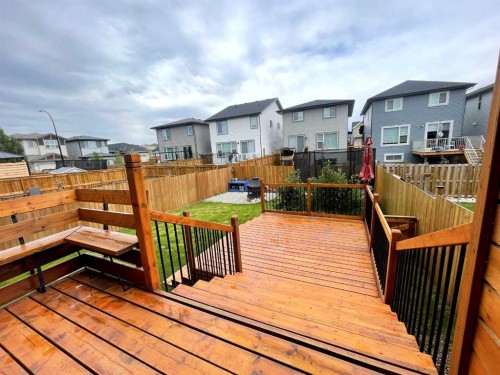 217 Buckskin Way, Cochrane, AB - Outdoor With Deck Patio Veranda With Exterior