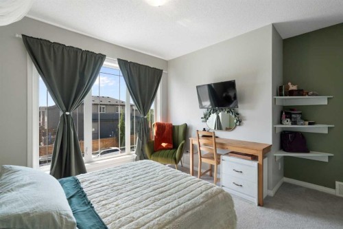 217 Buckskin Way, Cochrane, AB - Indoor Photo Showing Bedroom