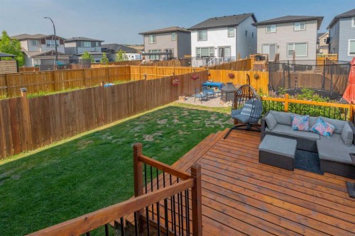 217 Buckskin Way, Cochrane, AB - Outdoor With Deck Patio Veranda With Backyard