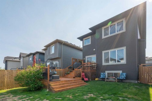 217 Buckskin Way, Cochrane, AB - Outdoor With Deck Patio Veranda With Exterior