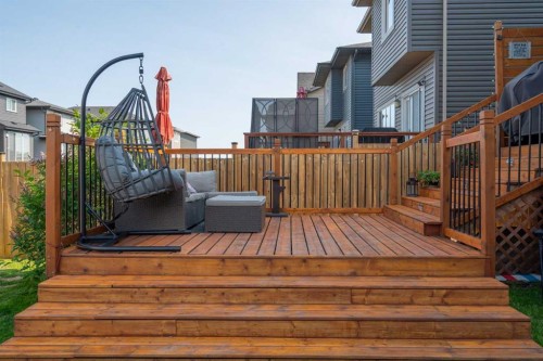 217 Buckskin Way, Cochrane, AB - Outdoor With Deck Patio Veranda With Exterior