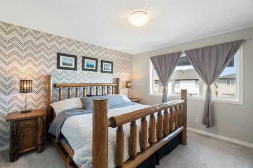 217 Buckskin Way, Cochrane, AB - Indoor Photo Showing Bedroom