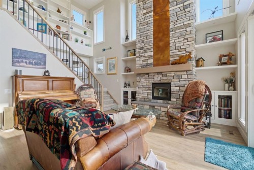 419 Cottageclub Cove, Rural Rocky View County, AB - Indoor With Fireplace