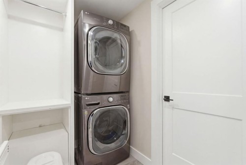 419 Cottageclub Cove, Rural Rocky View County, AB - Indoor Photo Showing Laundry Room