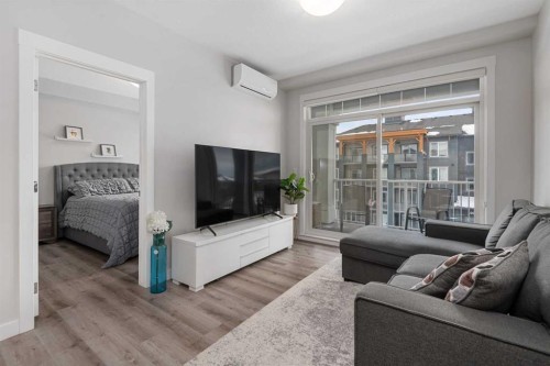 311-200 Auburn Meadows Common Se, Calgary, AB - Indoor Photo Showing Living Room