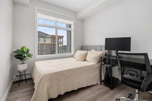 311-200 Auburn Meadows Common Se, Calgary, AB - Indoor Photo Showing Bedroom