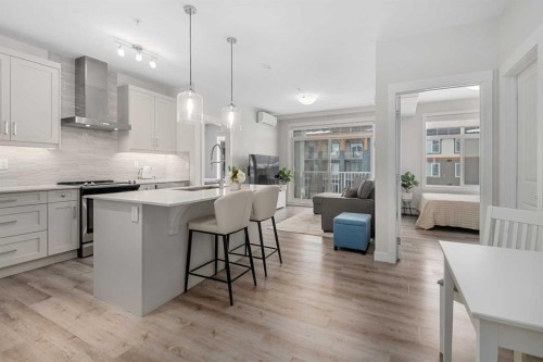 311-200 Auburn Meadows Common Se, Calgary, AB - Indoor Photo Showing Kitchen With Upgraded Kitchen