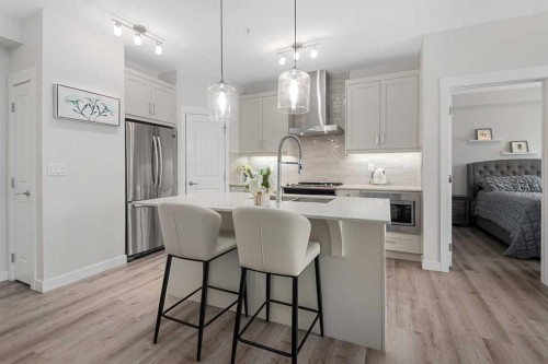 311-200 Auburn Meadows Common Se, Calgary, AB - Indoor Photo Showing Kitchen With Stainless Steel Kitchen With Upgraded Kitchen