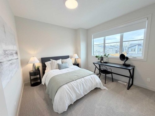 406 Crimson Ridge Place Nw, Calgary, AB - Indoor Photo Showing Bedroom