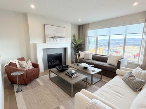 406 Crimson Ridge Place Nw, Calgary, AB - Indoor Photo Showing Living Room With Fireplace