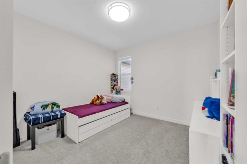 103-116 Saddlestone Heath Ne, Calgary, AB - Indoor Photo Showing Bedroom