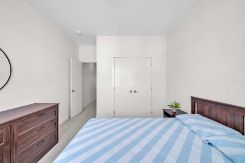 103-116 Saddlestone Heath Ne, Calgary, AB - Indoor Photo Showing Bedroom