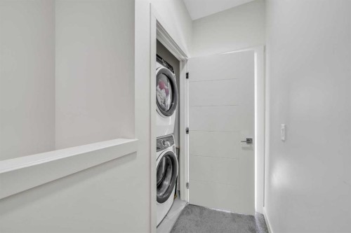 103-116 Saddlestone Heath Ne, Calgary, AB - Indoor Photo Showing Laundry Room