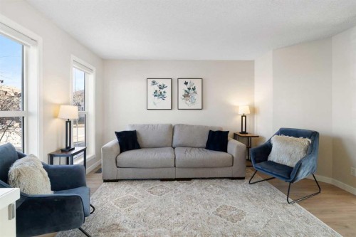 9 Elgin Mews Se, Calgary, AB - Indoor Photo Showing Living Room