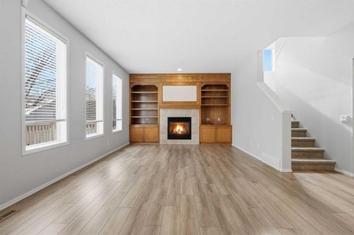 15172 Prestwick Boulevard Se, Calgary, AB - Indoor Photo Showing Living Room With Fireplace