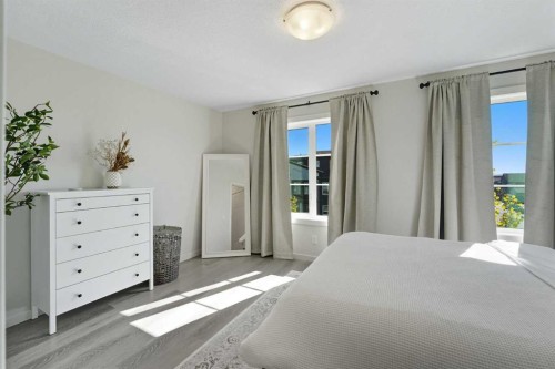 102-474 Seton Circle Se, Calgary, AB - Indoor Photo Showing Bedroom