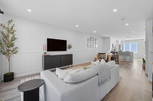 102-474 Seton Circle Se, Calgary, AB - Indoor Photo Showing Living Room