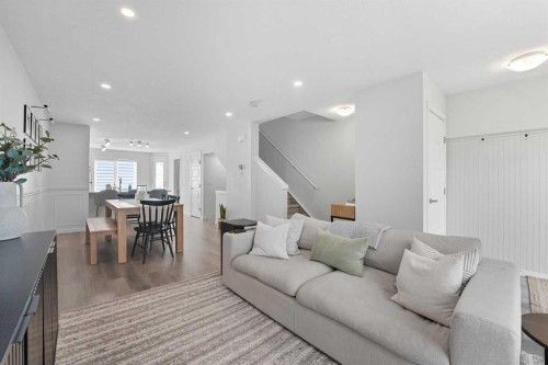 102-474 Seton Circle Se, Calgary, AB - Indoor Photo Showing Living Room