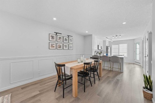 102-474 Seton Circle Se, Calgary, AB - Indoor Photo Showing Dining Room