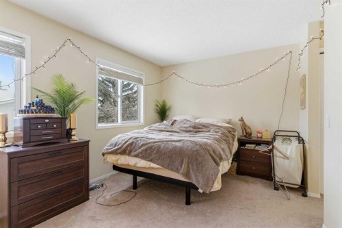 59 Abbeydale Villas Ne, Calgary, AB - Indoor Photo Showing Bedroom
