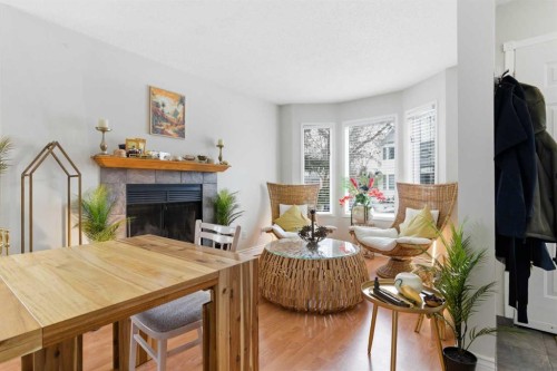 59 Abbeydale Villas Ne, Calgary, AB - Indoor Photo Showing Living Room With Fireplace
