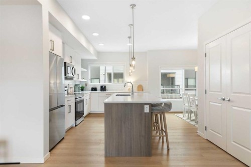 608-20295 Seton Way Se, Calgary, AB - Indoor Photo Showing Kitchen With Stainless Steel Kitchen With Upgraded Kitchen