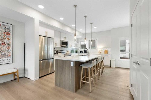 608-20295 Seton Way Se, Calgary, AB - Indoor Photo Showing Kitchen With Stainless Steel Kitchen With Upgraded Kitchen